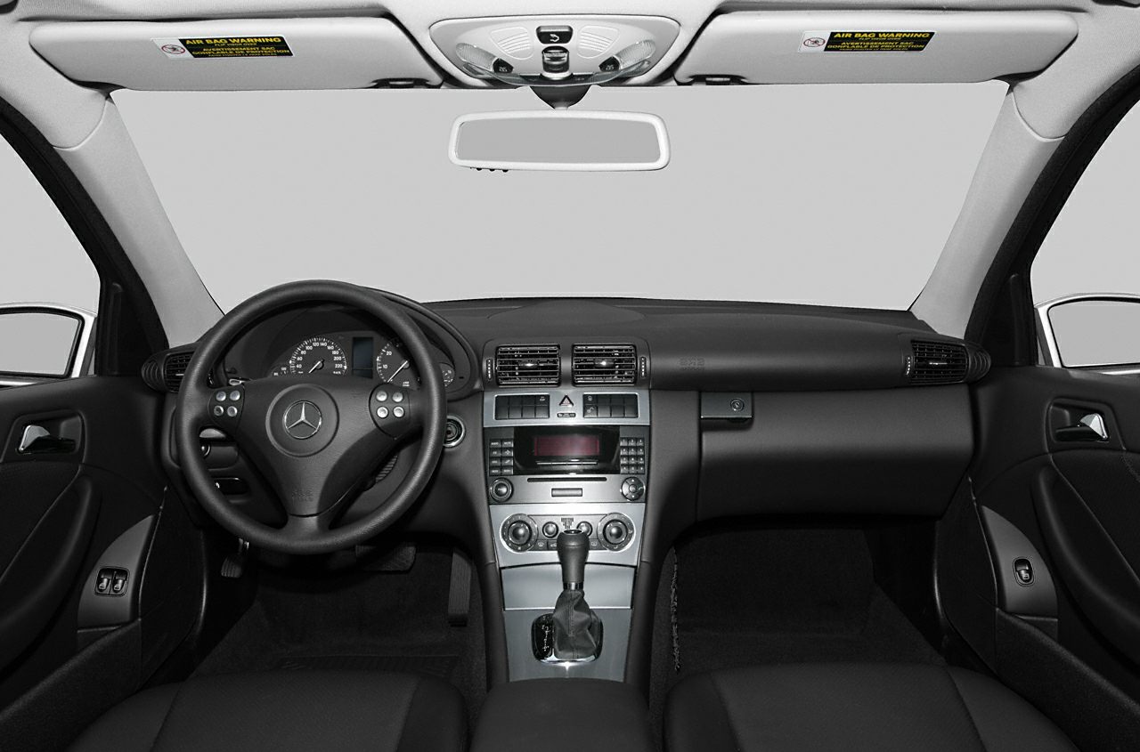 Dashboard and steering wheel with center console and controls