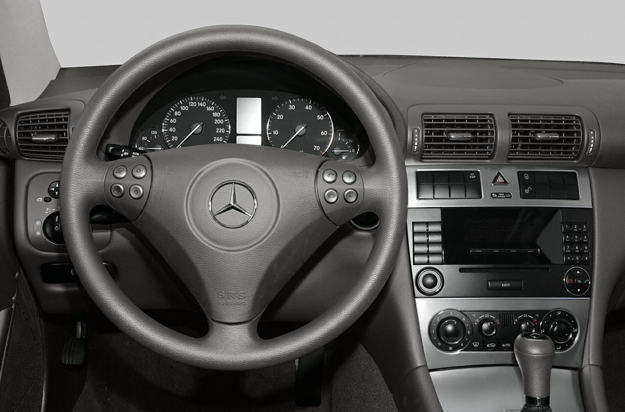 Steering wheel and dashboard controls of a car interior