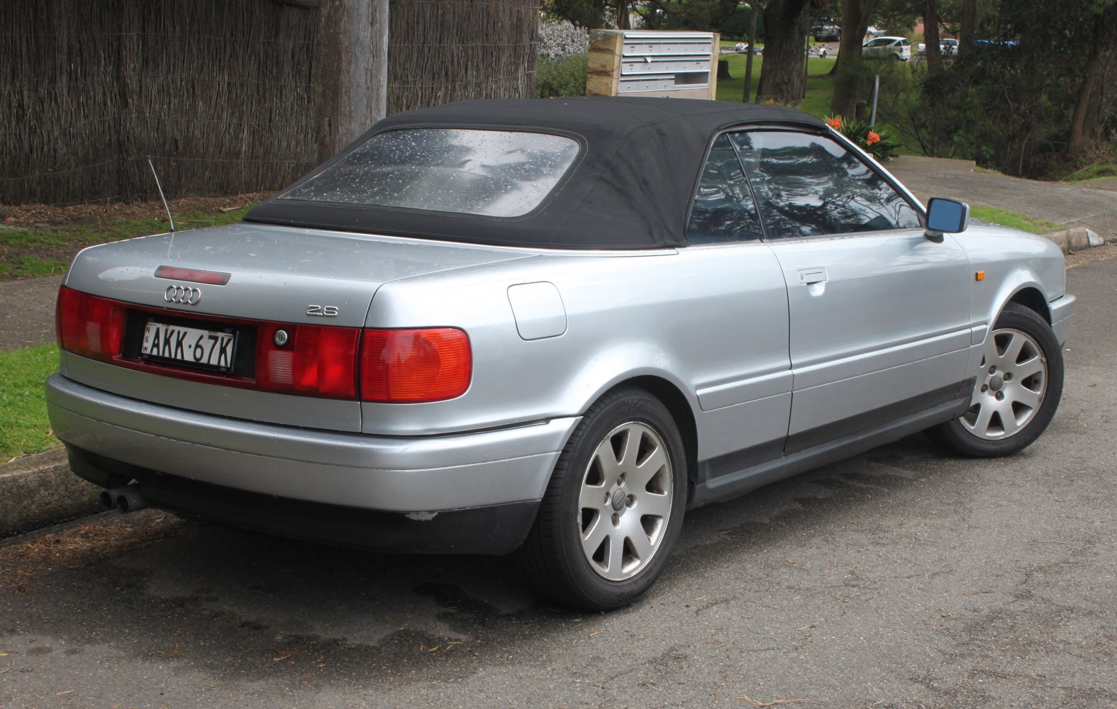 Convertible with black soft top and silver alloy wheels