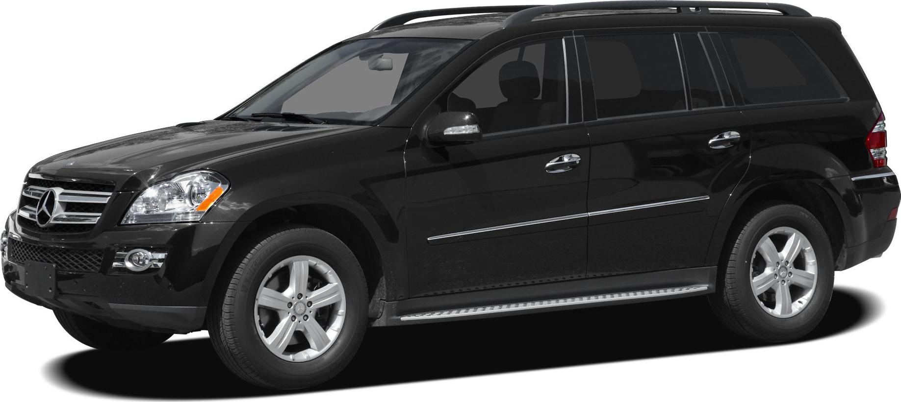 Black SUV with chrome trim, roof rails, and side step board