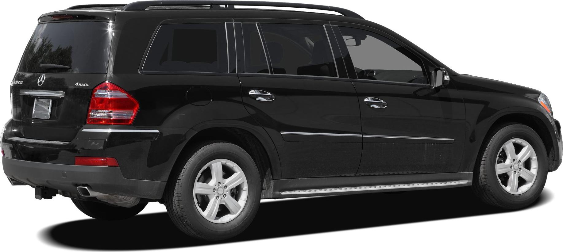 Black luxury SUV rear side with chrome trim and alloy wheels