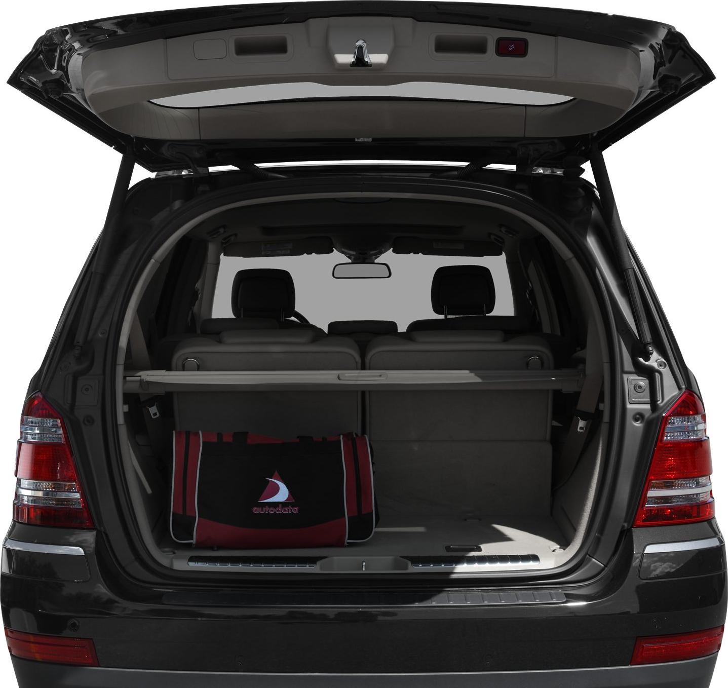 Open rear trunk with cargo cover and folded seats