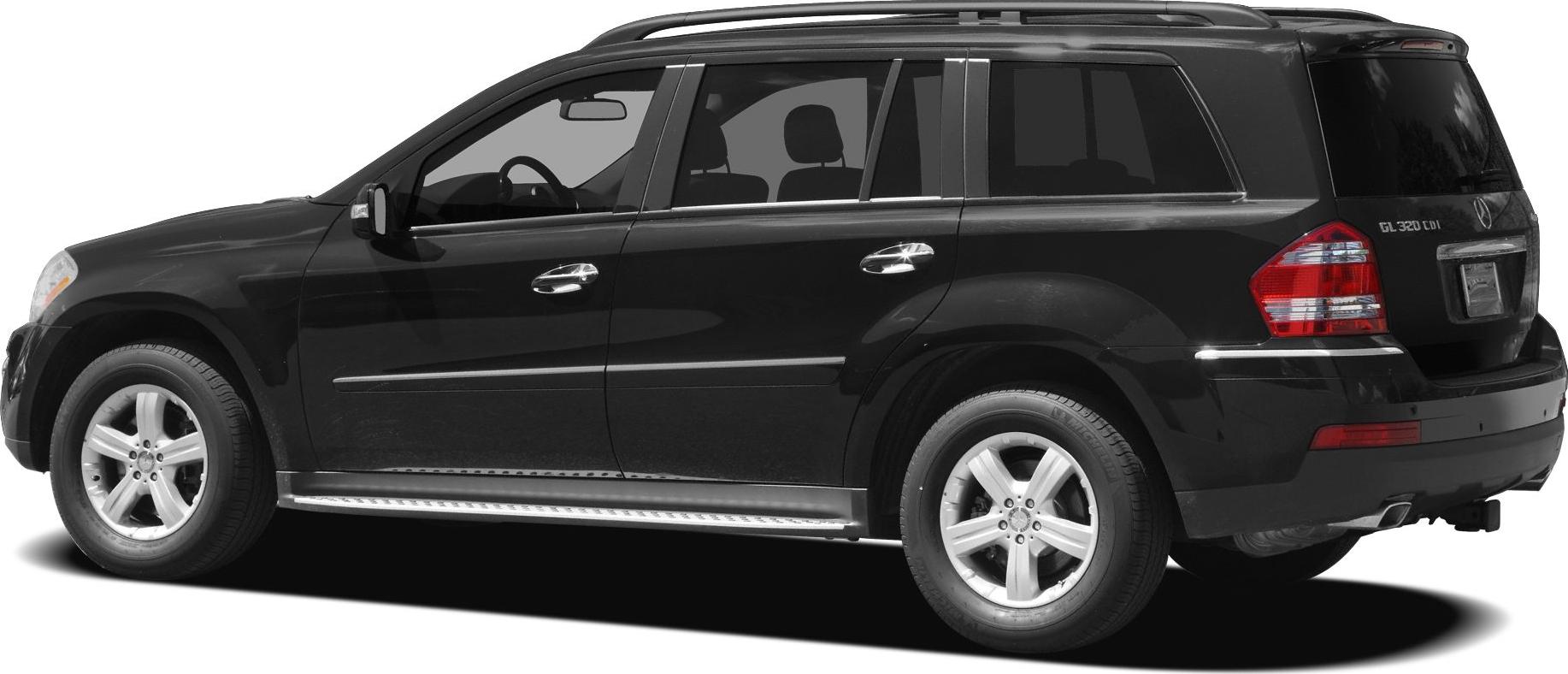 Side profile of large SUV with step board and alloy wheels