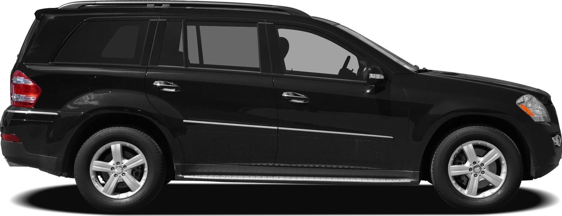 Side profile of black luxury SUV with alloy wheels