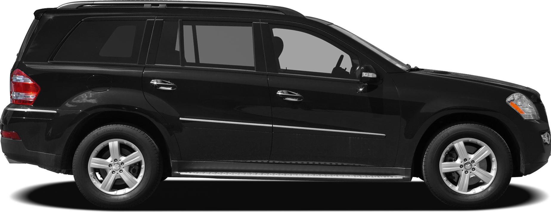 Side profile of SUV with alloy wheels and running boards