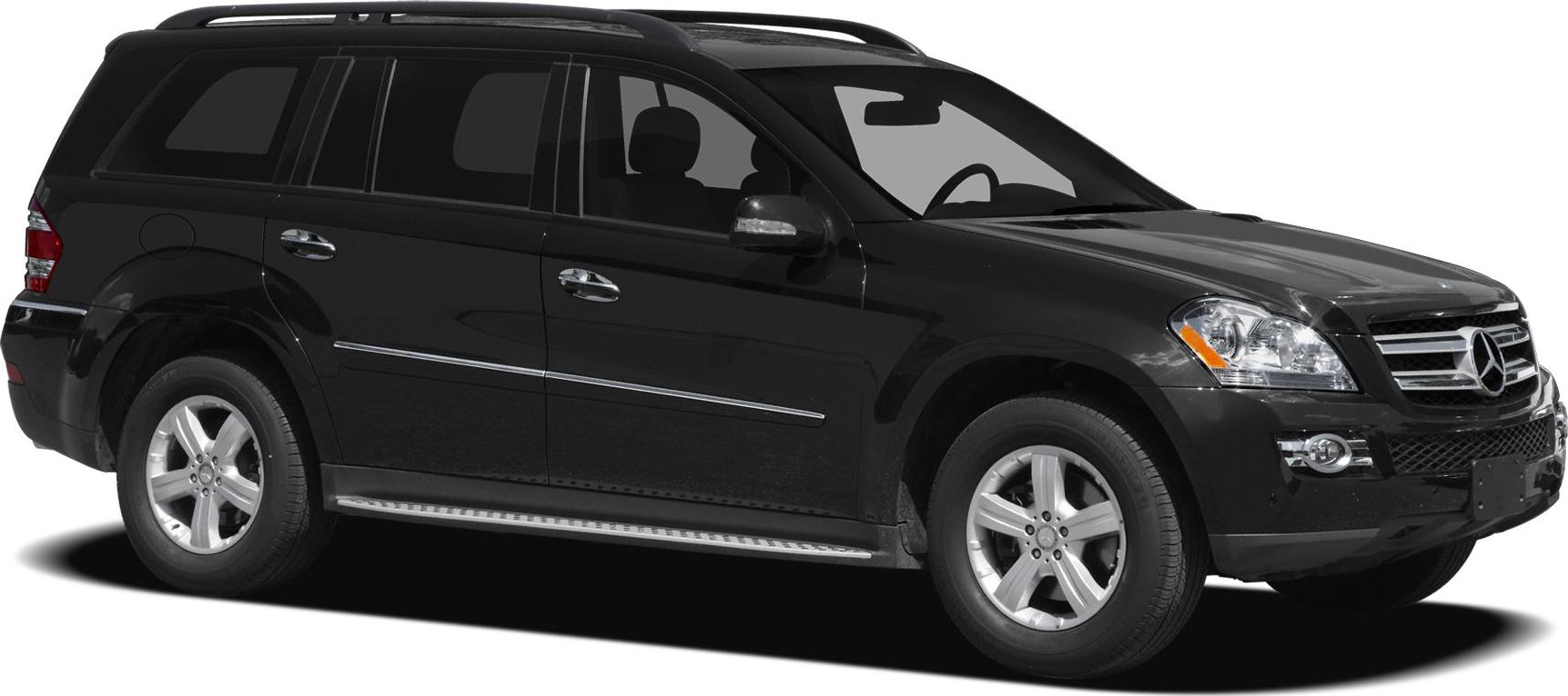 Front side view of a black SUV with alloy wheels and roof rails
