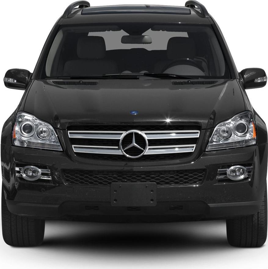 Front view with signature grille and dual headlights of a luxury SUV.