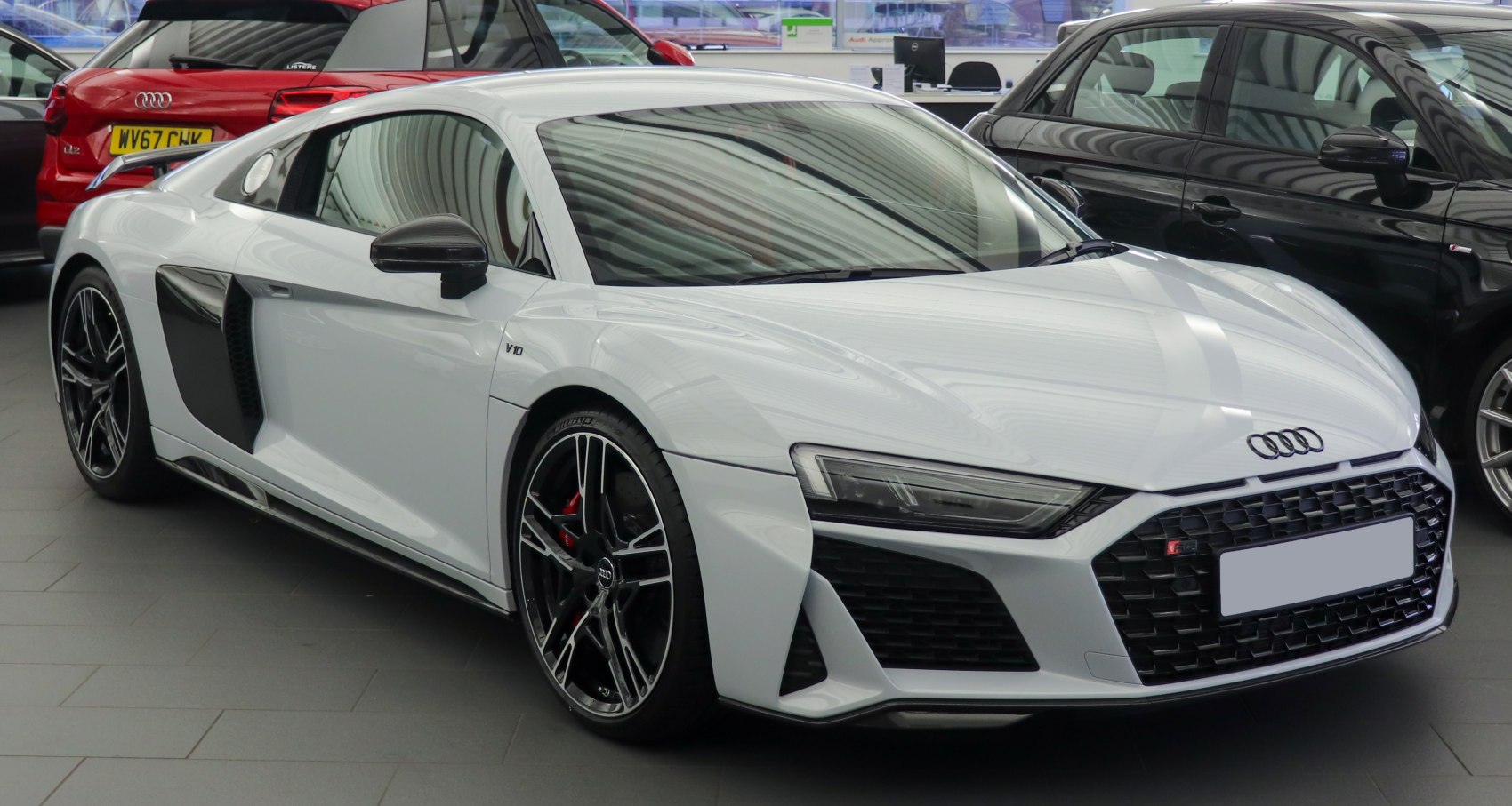 Front and side view with sharp headlights and side air intake