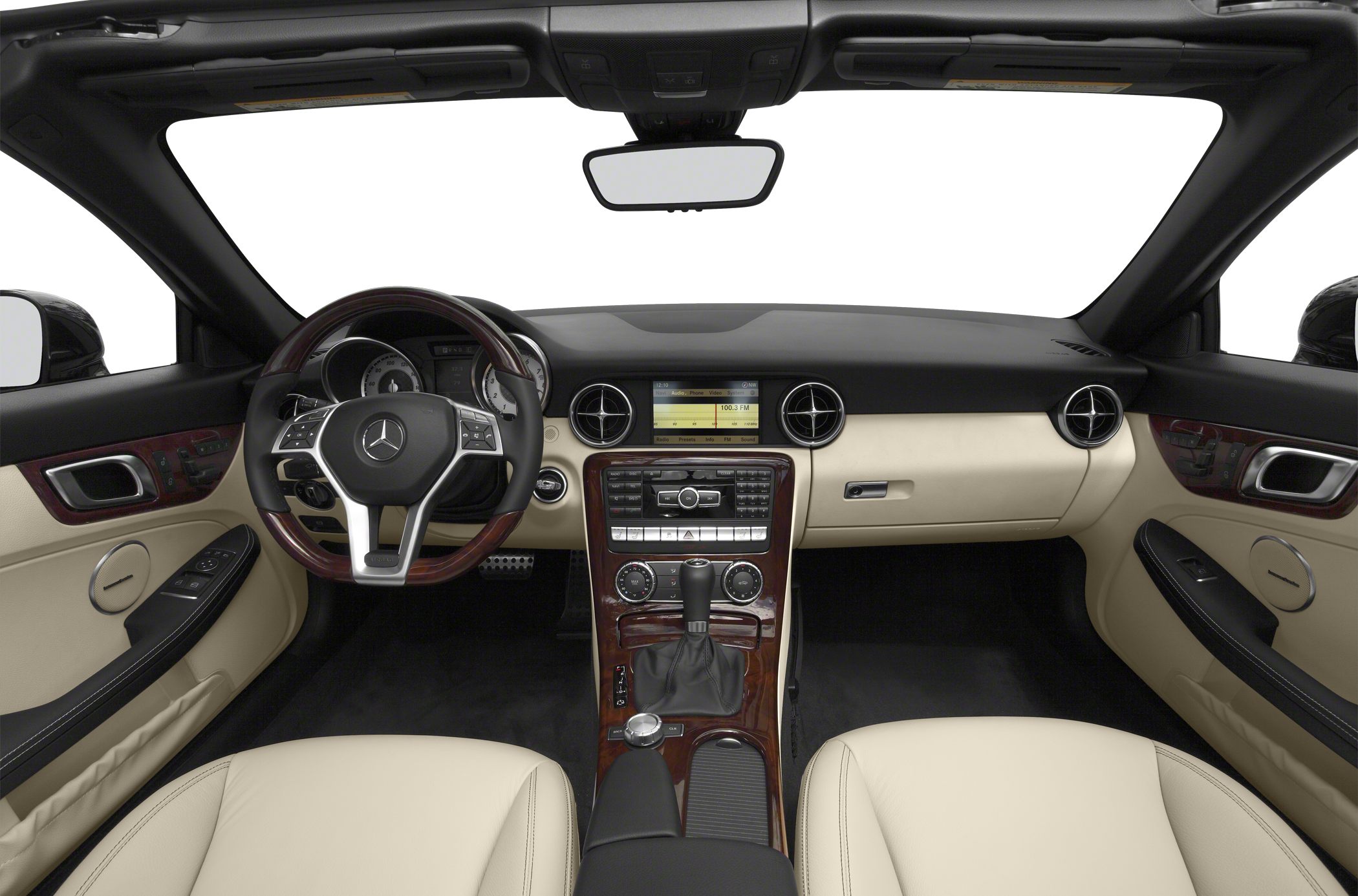 Luxury beige leather interior with wood trim and modern dashboard