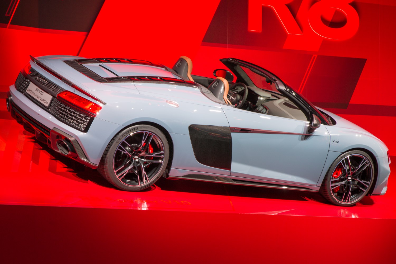 Convertible with V10 badge, rear ventilation grilles, and black alloy wheels