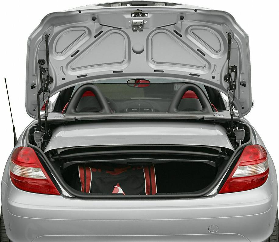 Rear trunk and convertible roof storage compartment of a convertible sportscar.
