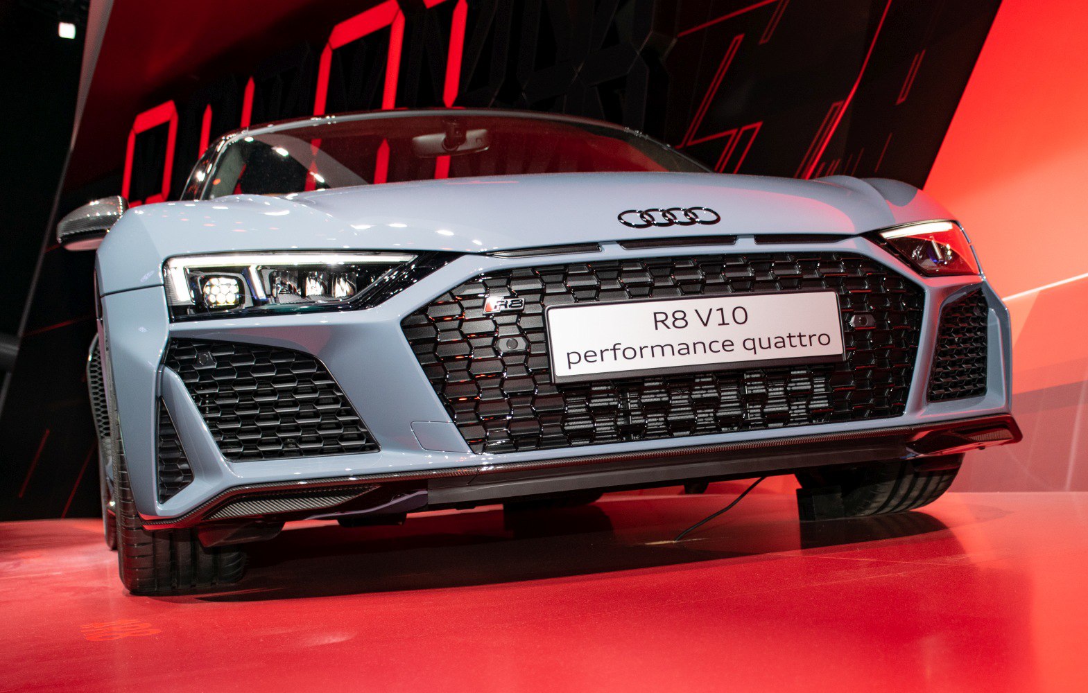 Close-up of front grille and LED headlights