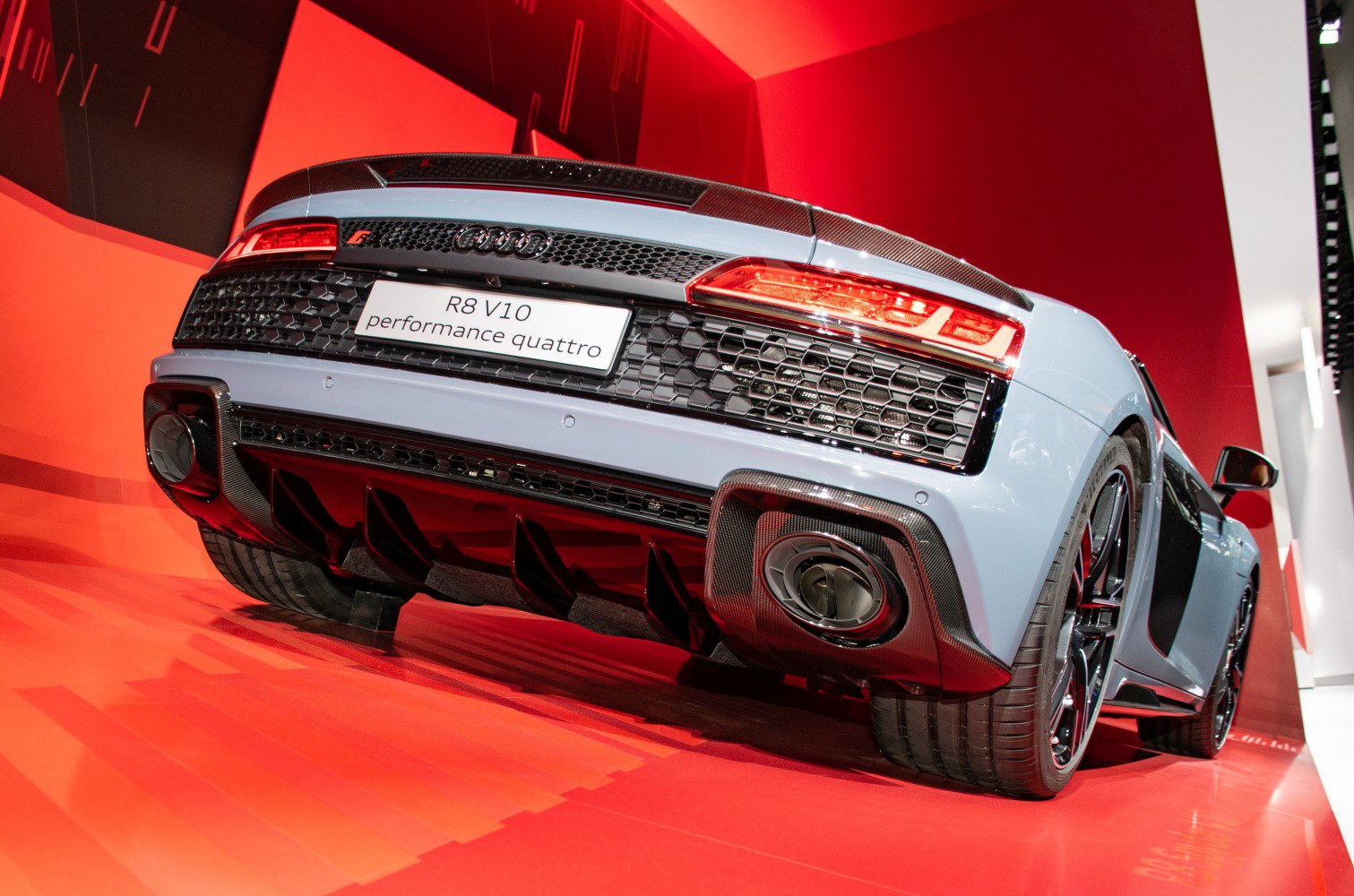 Rear view of performance exhaust, diffuser, and rear light cluster