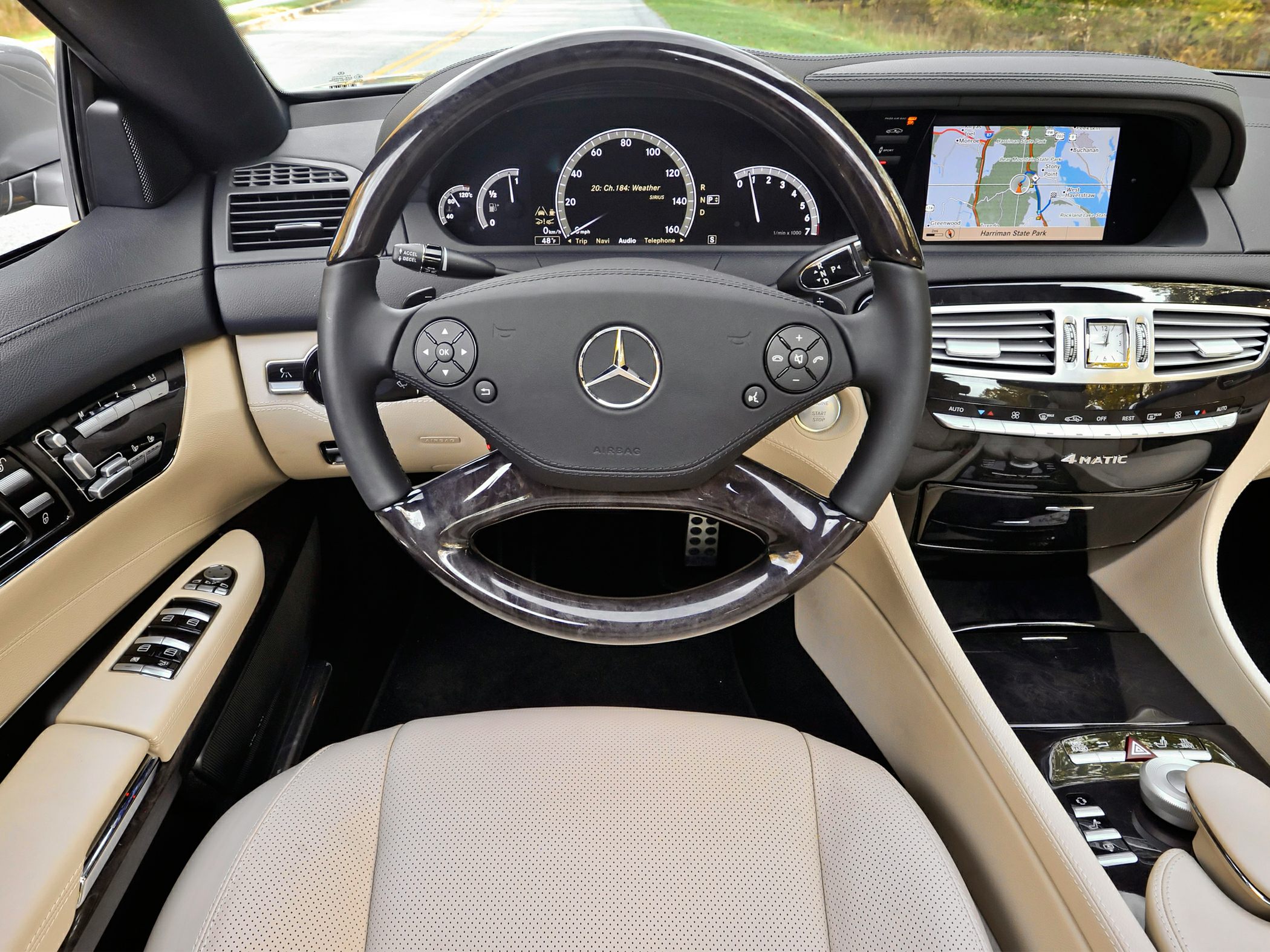 Luxury steering wheel with digital dashboard and navigation display
