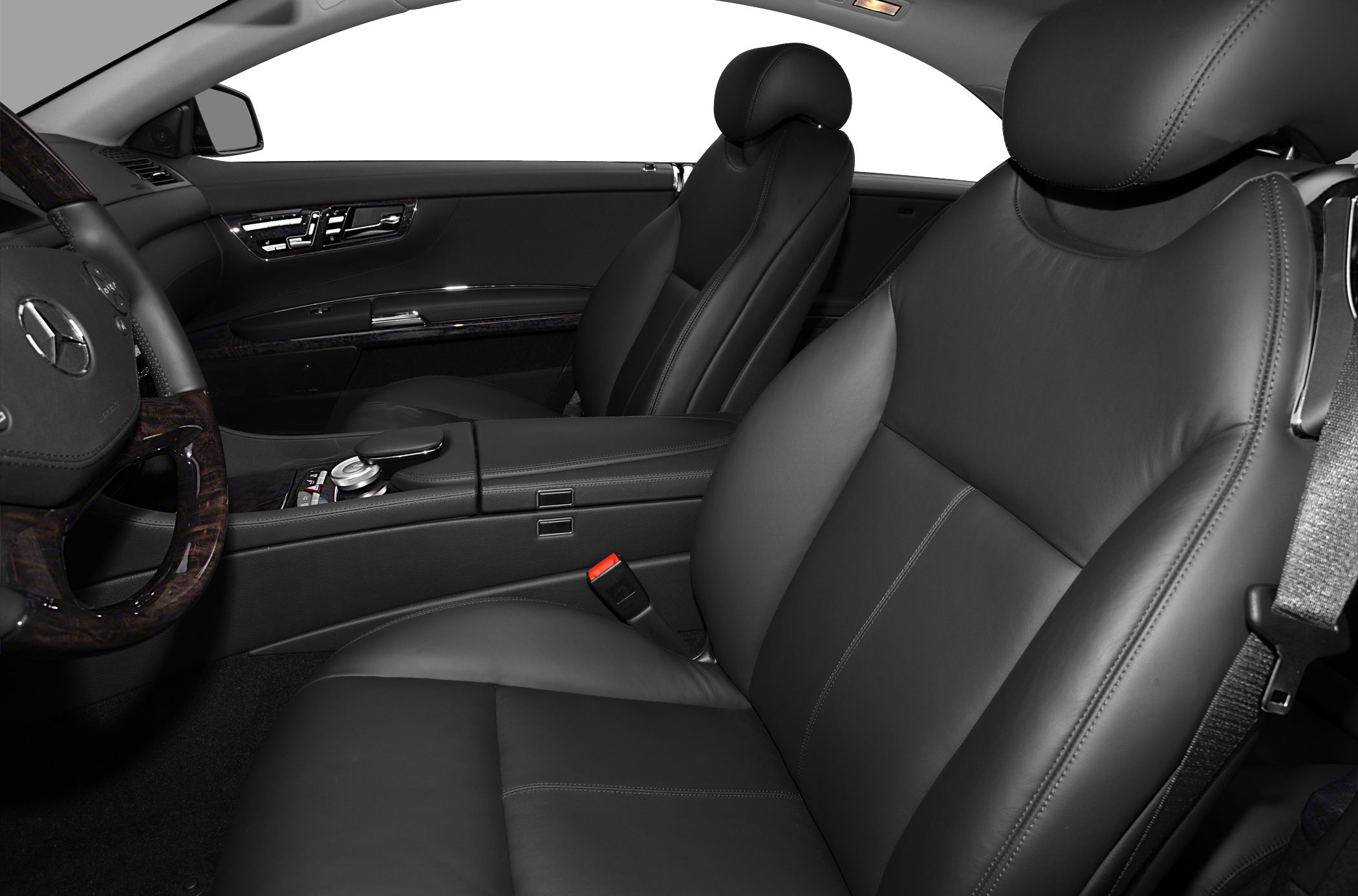 Black leather seats with wood trim and advanced dashboard controls