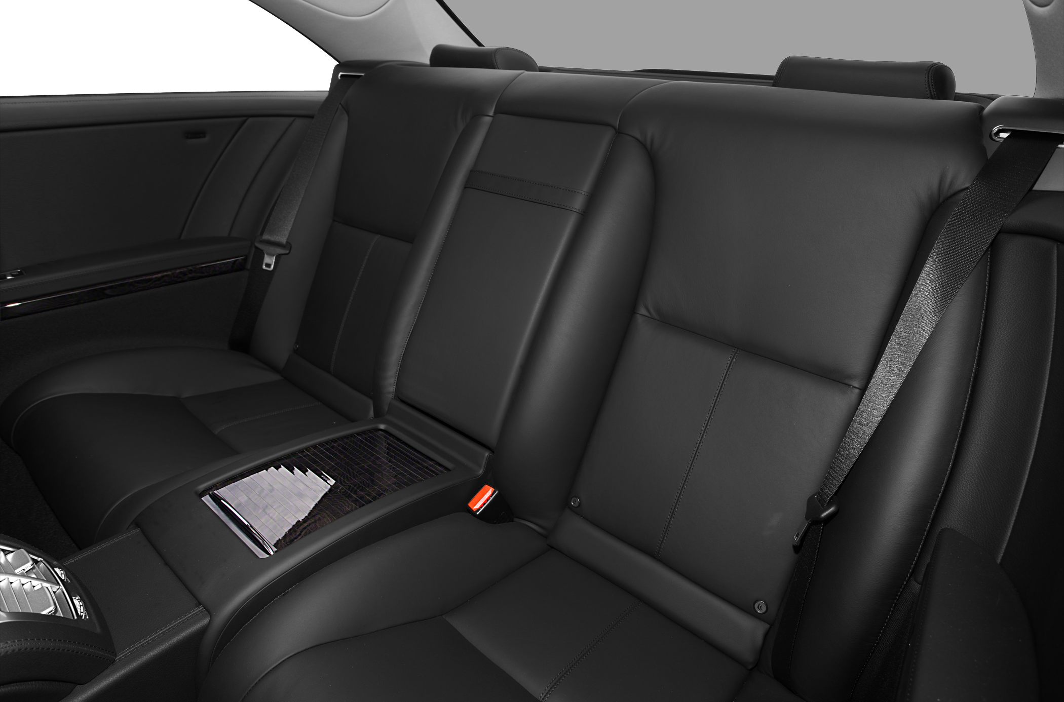 Black leather rear seats with integrated center console and seat belts