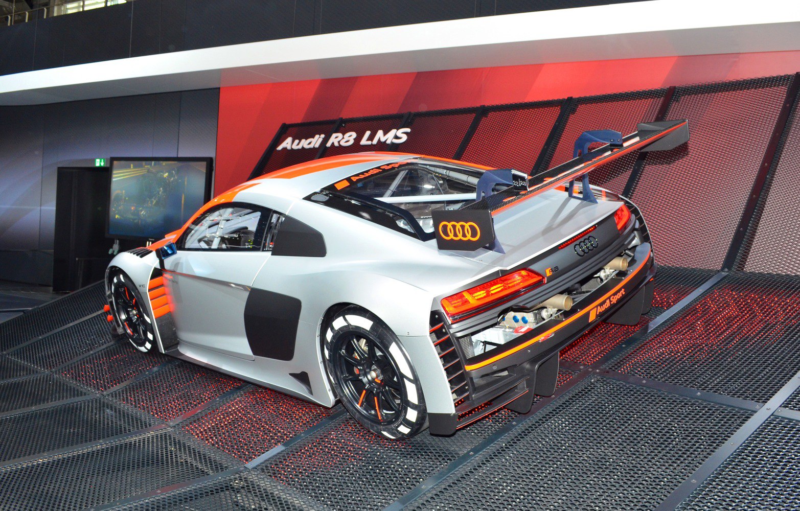 Rear wing and aerodynamic details of a high-performance racing vehicle