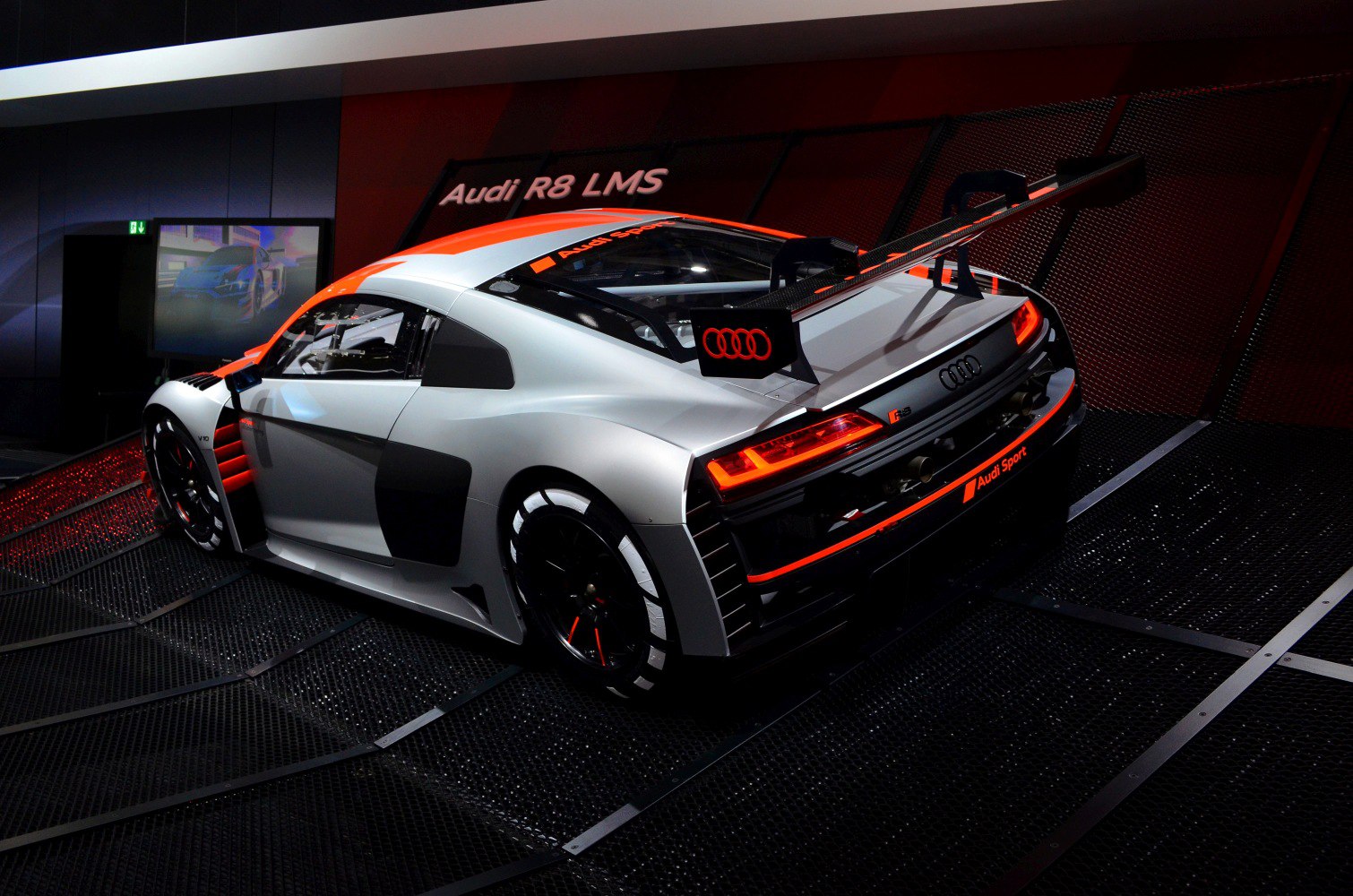 Rear-side view with racing wing and aerodynamic design