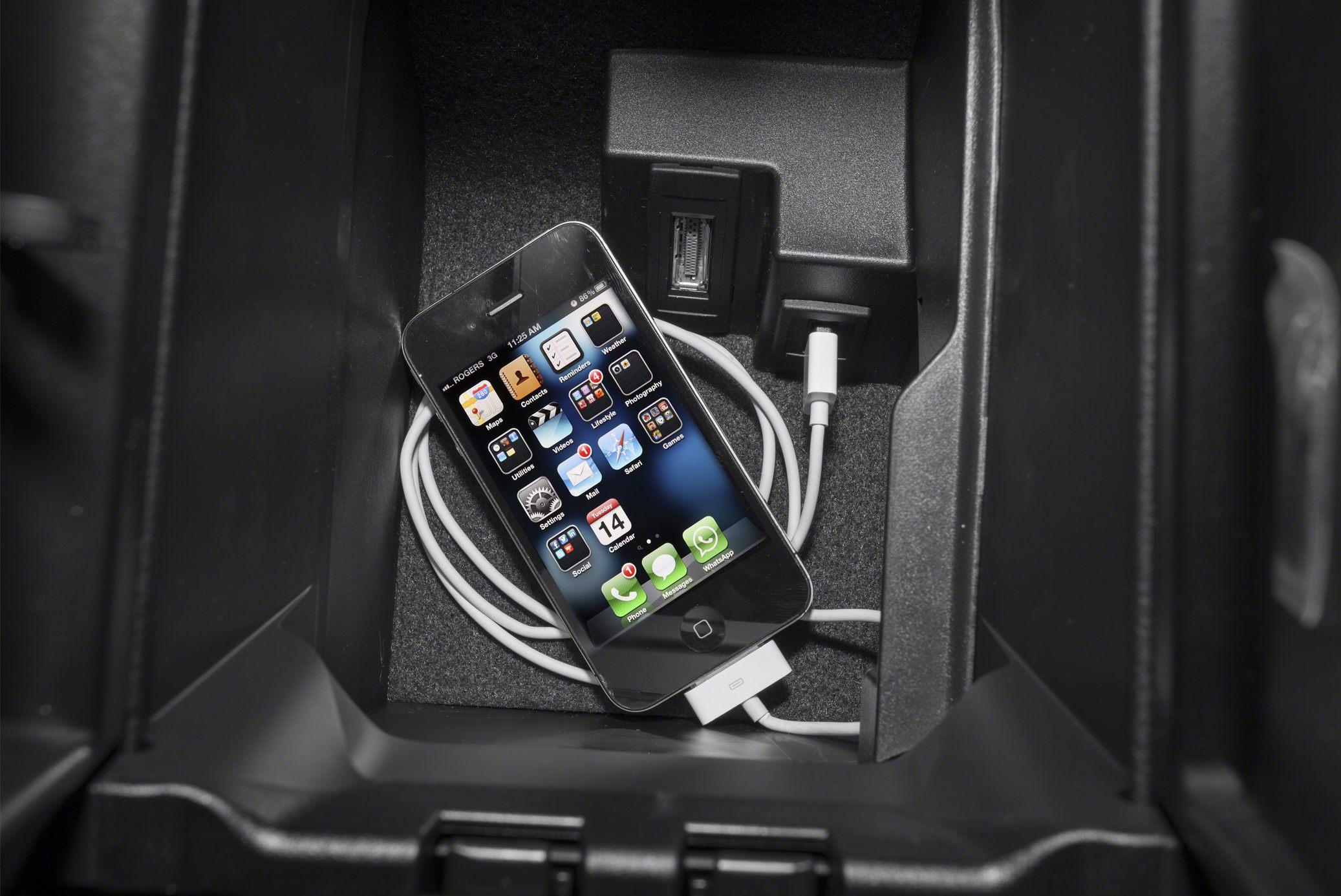Phone connected to USB port inside center console
