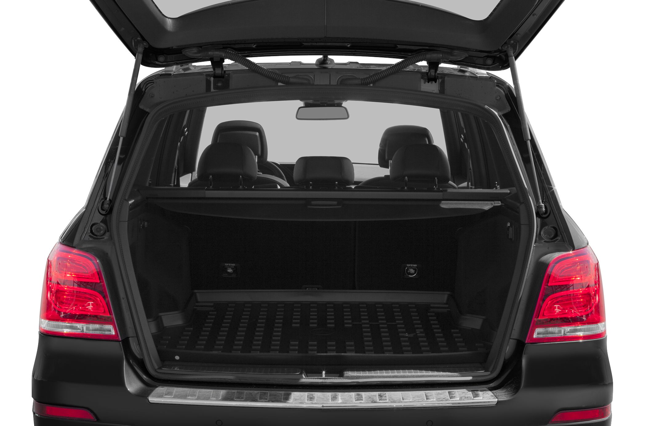 Open trunk showcasing cargo space and rear seats of SUV