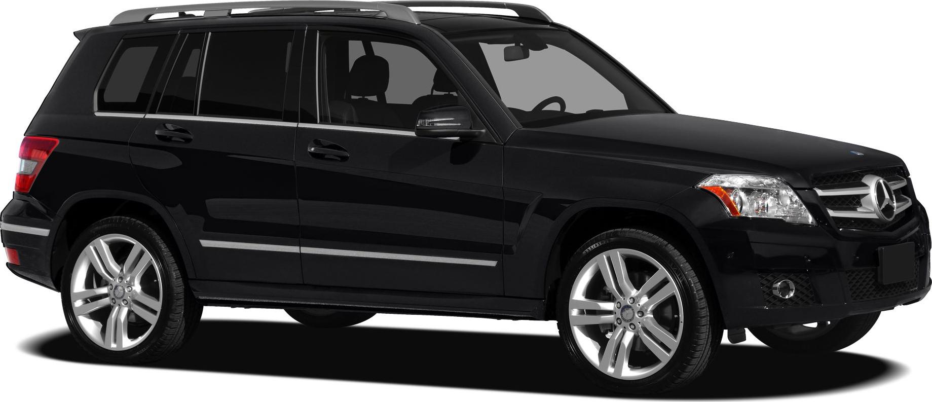 Black luxury SUV side profile with alloy wheels and roof rails