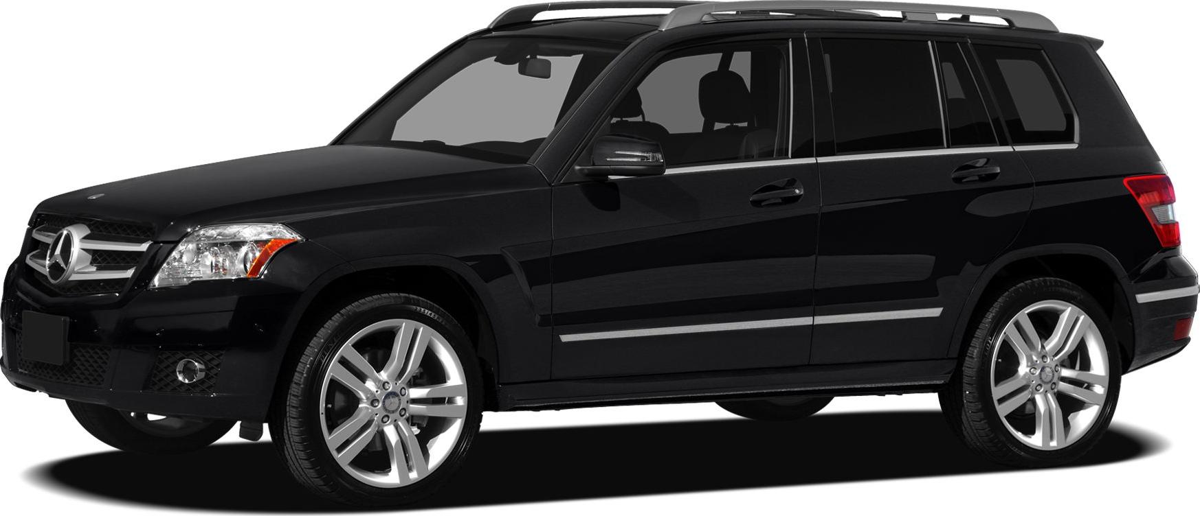 Side front view of black SUV with alloy wheels and roof rails