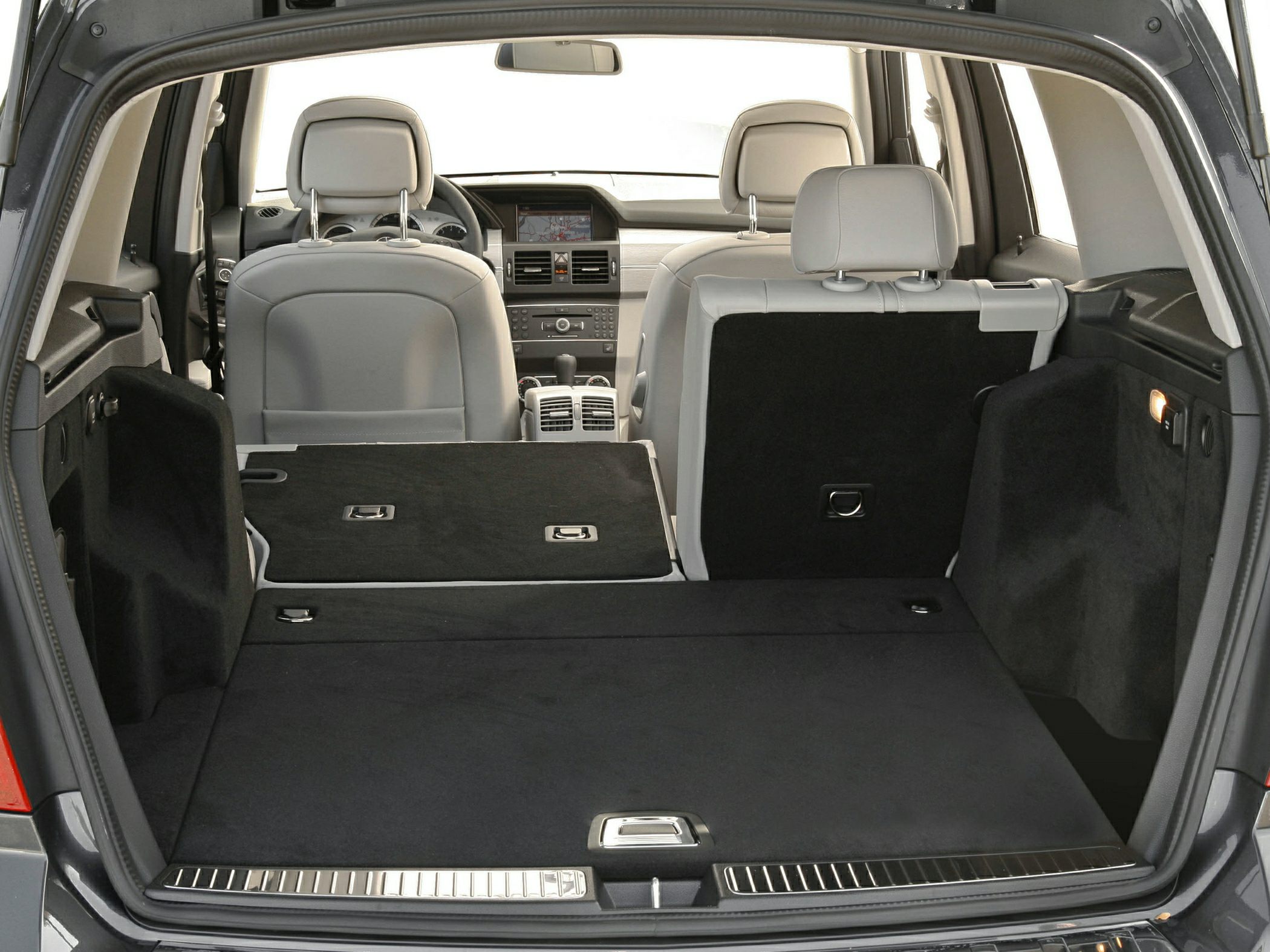 Wide cargo space with fold-flat rear seats and luxury SUV interior