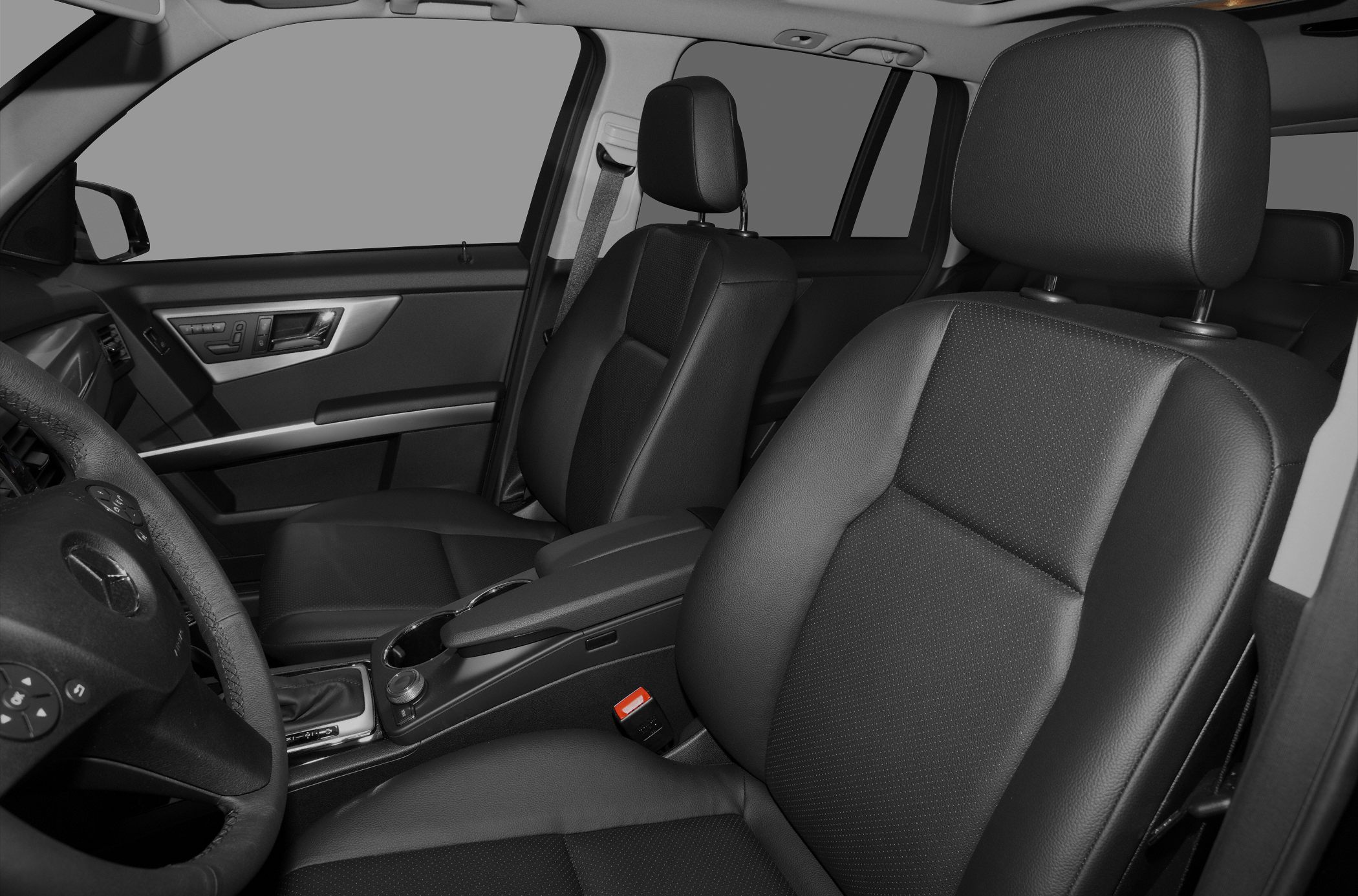 Leather seats with headrests and a sleek modern center console design