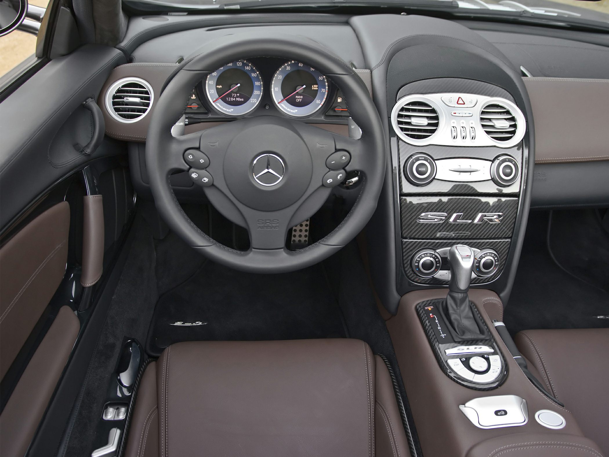 Steering wheel, dashboard, and center console with carbon fiber trim