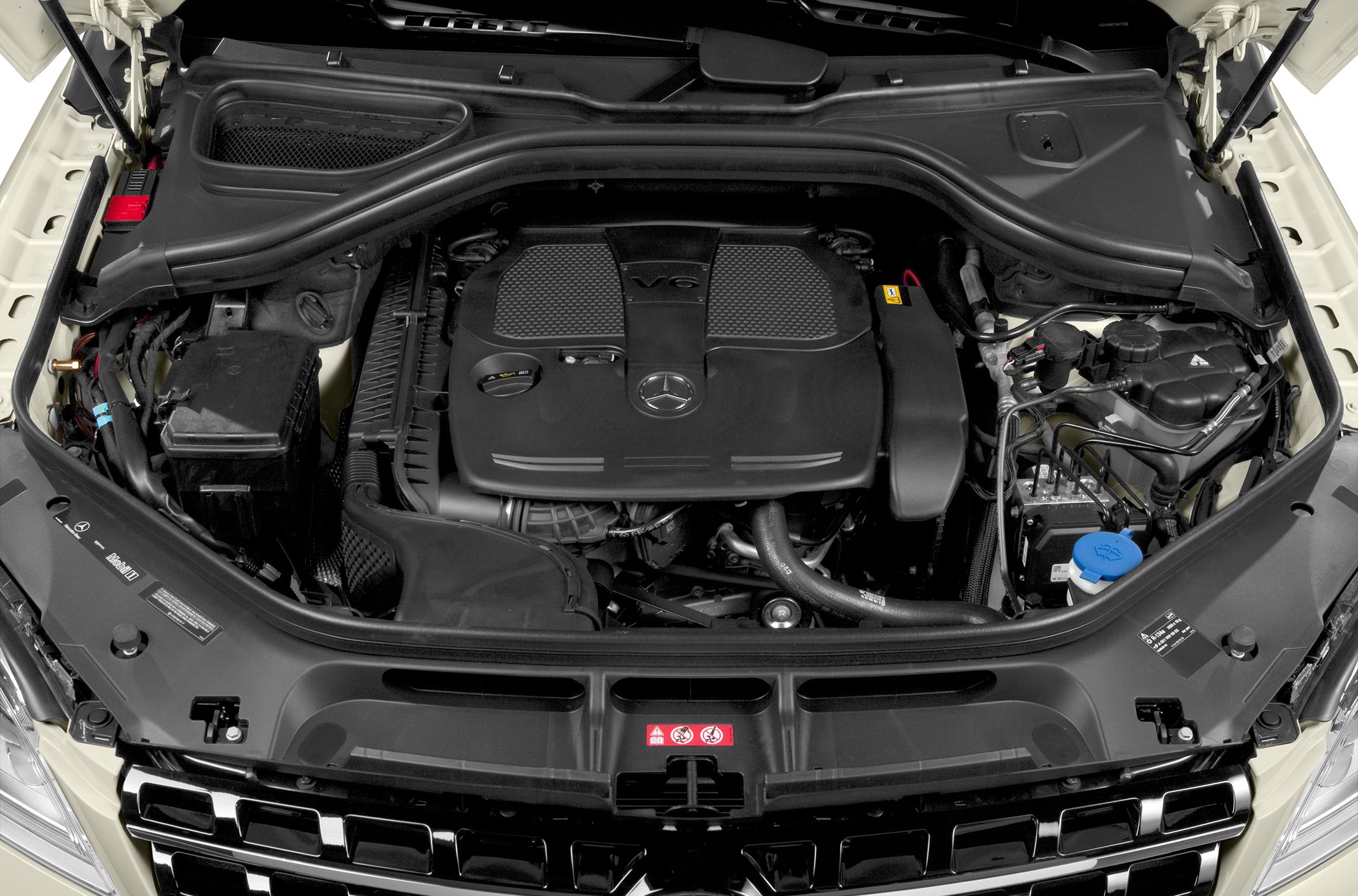 V6 engine bay with prominent engine cover and surrounding components