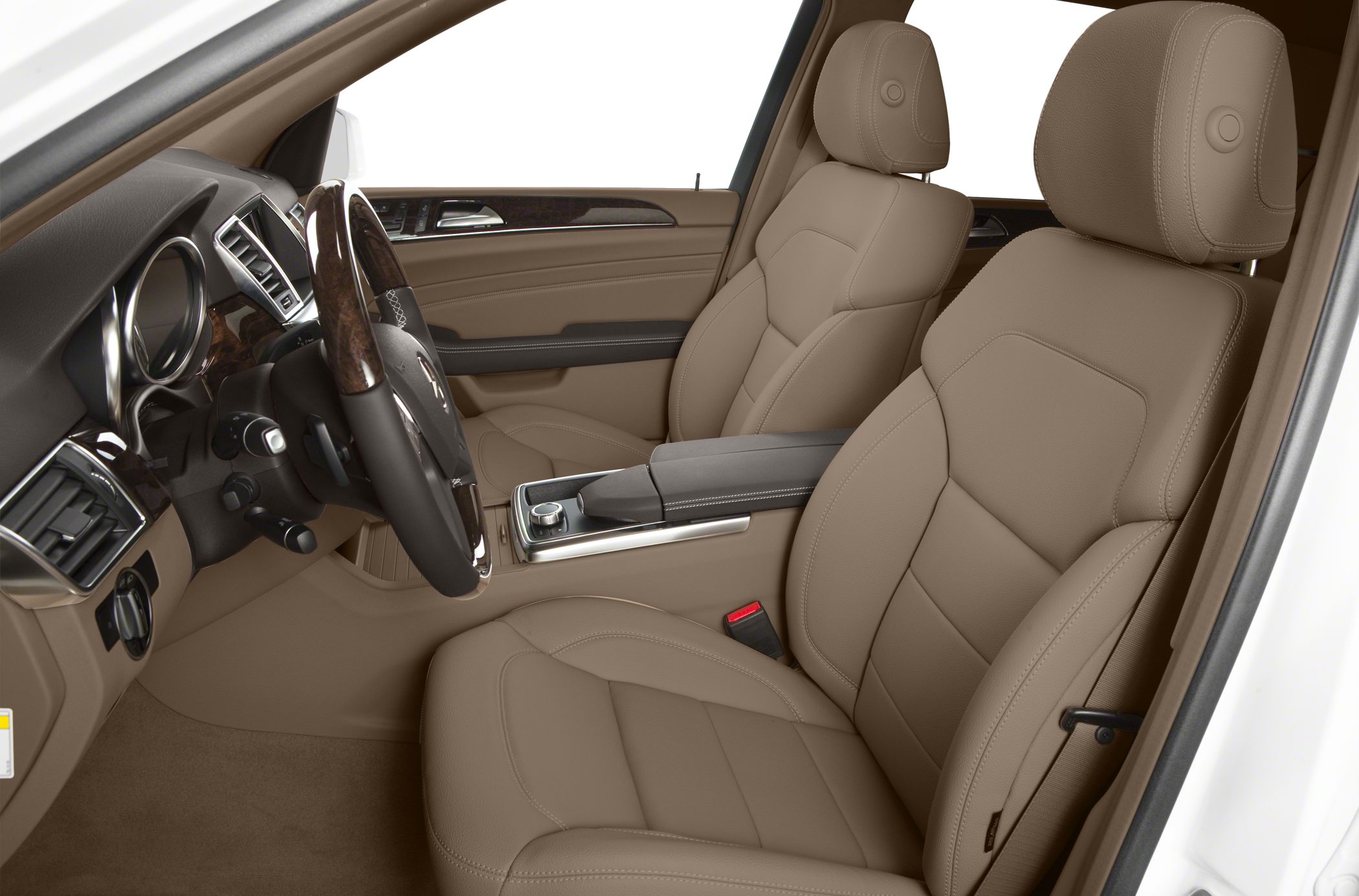 Beige leather front seats with wood-trimmed dashboard and steering wheel