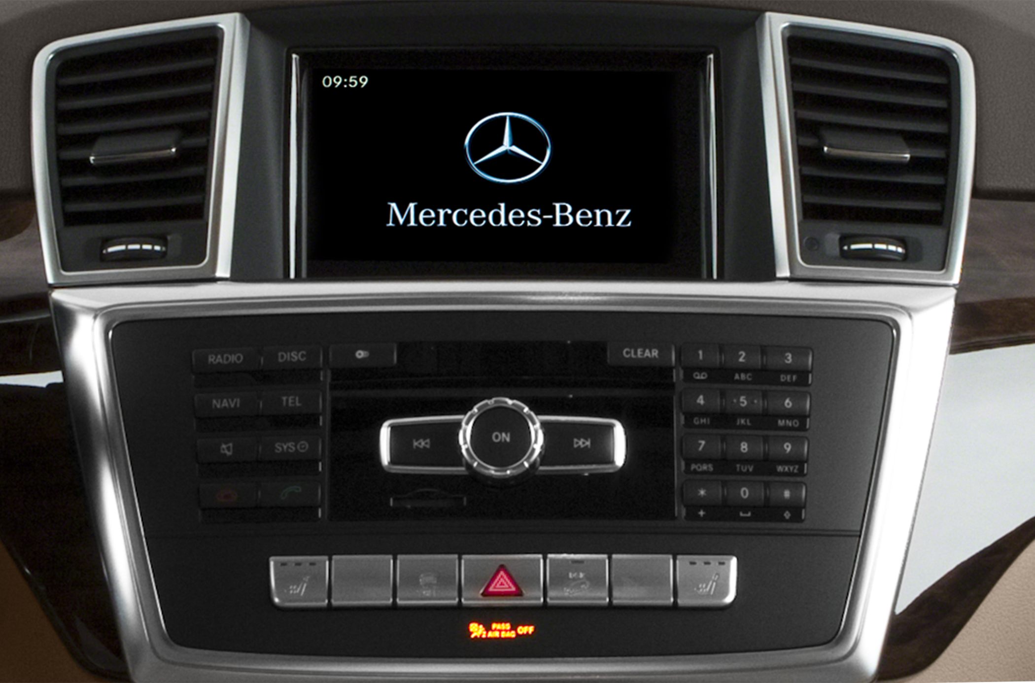 Multimedia console with central control knob and display screen