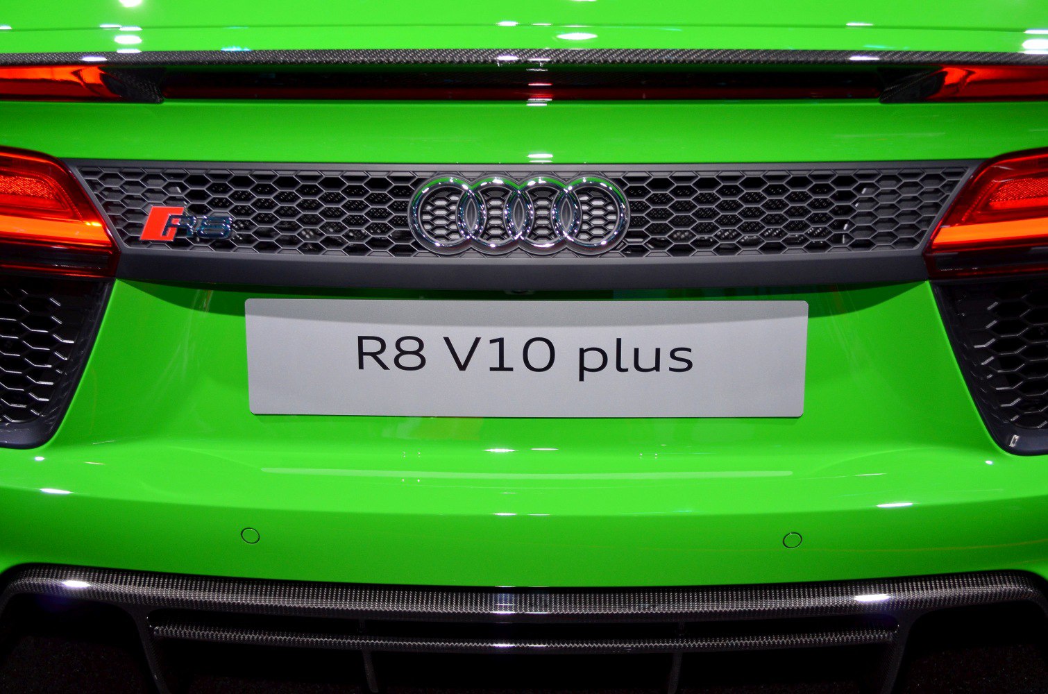 Rear grille with Audi rings, RS badge, and R8 V10 plus plate