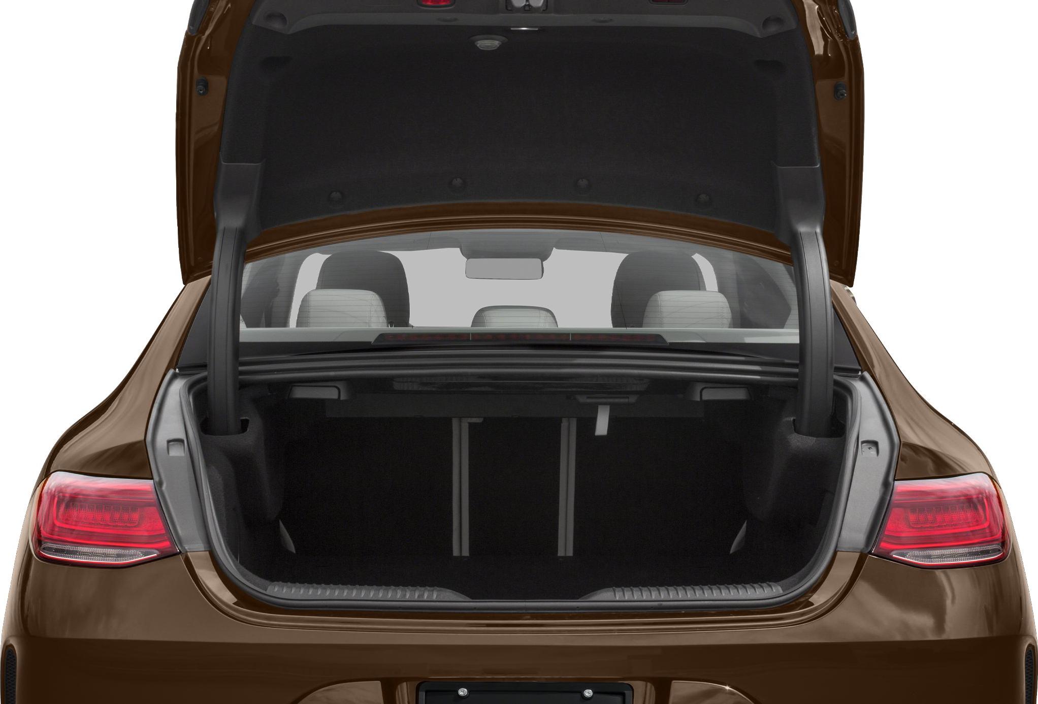 Open trunk space with illuminated rear tail lights and visible rear seats.