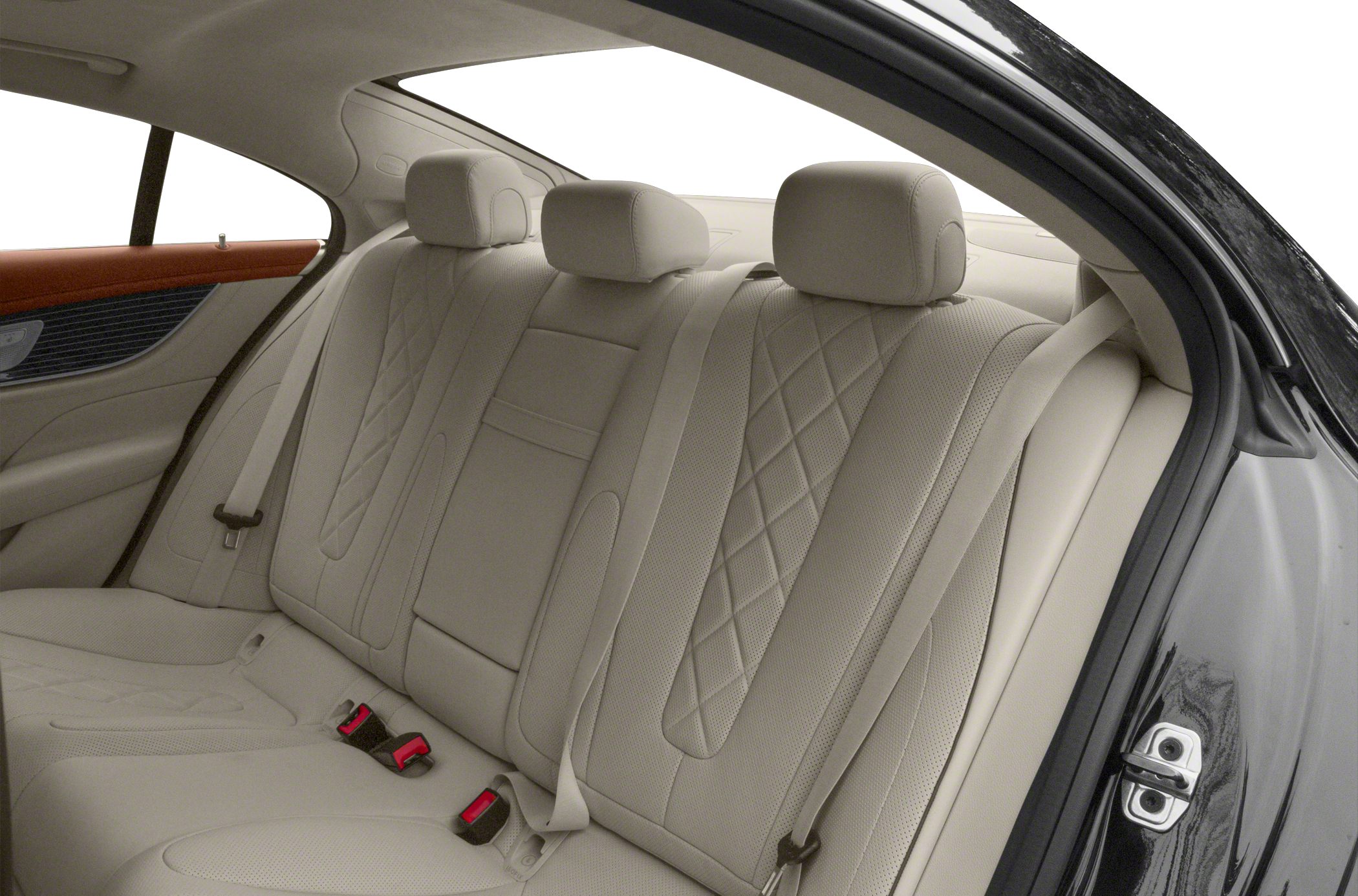 Luxury quilted leather rear seats with integrated headrests and seatbelt in premium car interior.