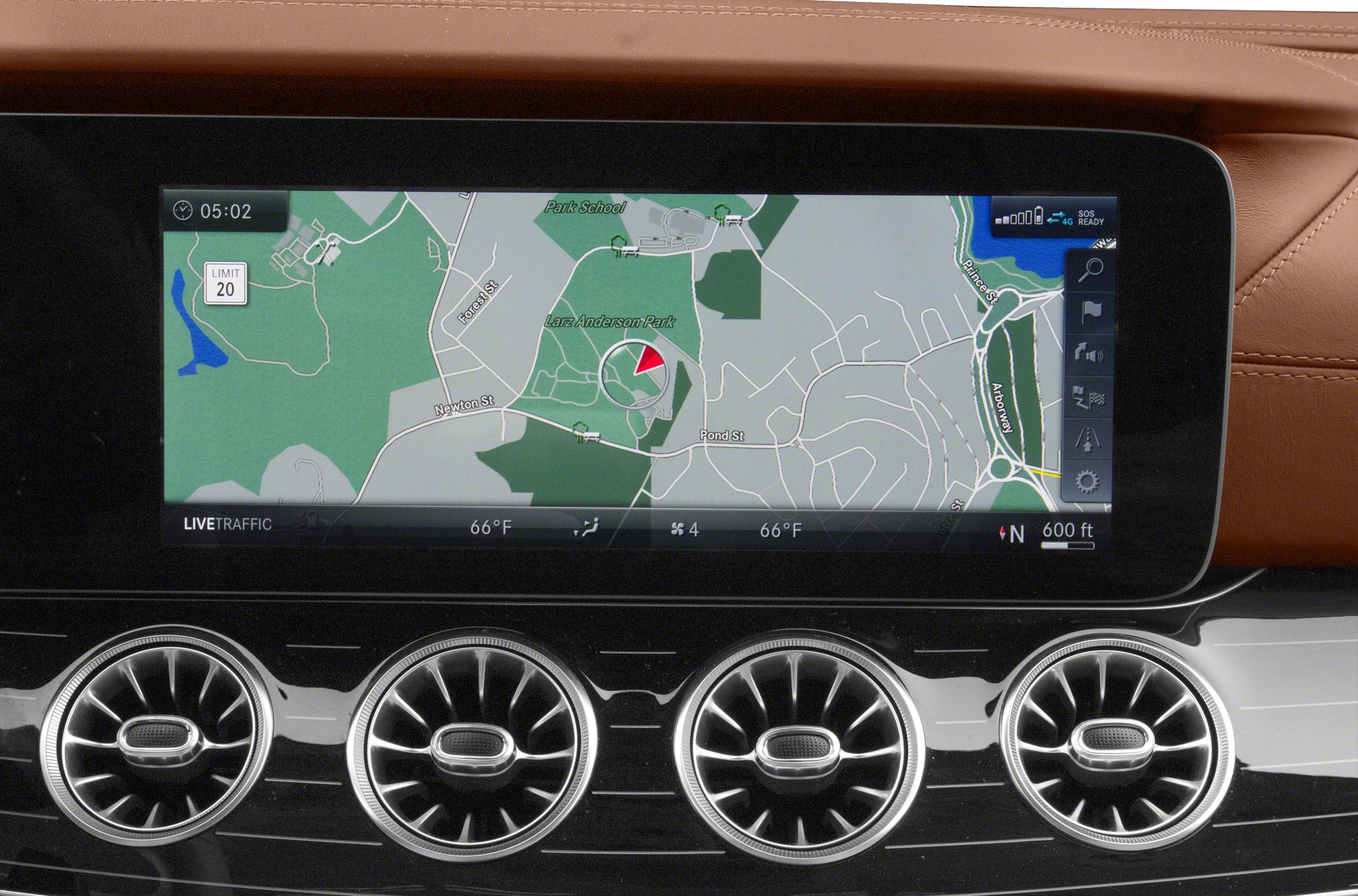 Advanced infotainment display with navigation map and turbine-style air vents