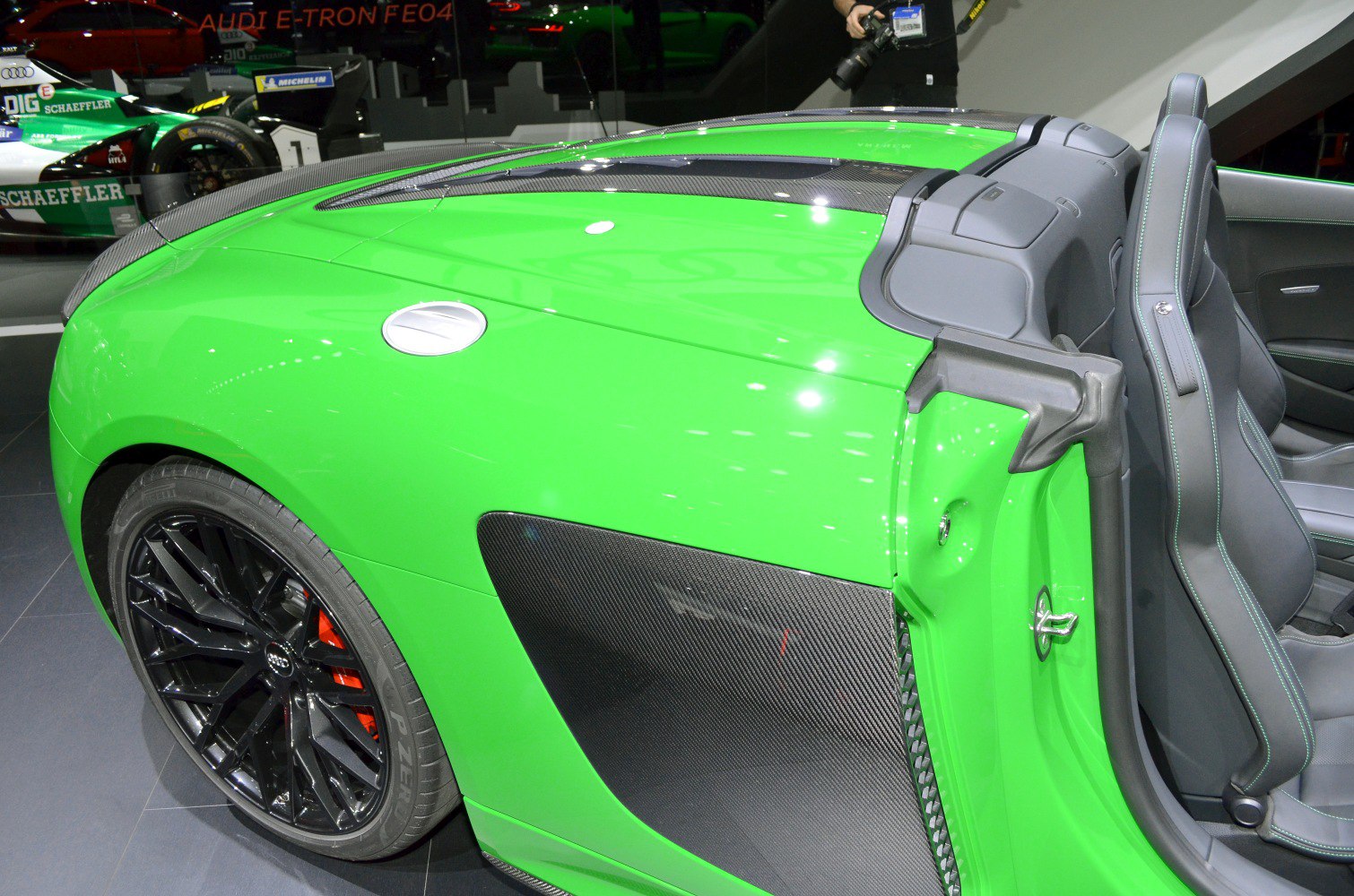 Green convertible with carbon fiber side blade and black alloy wheel
