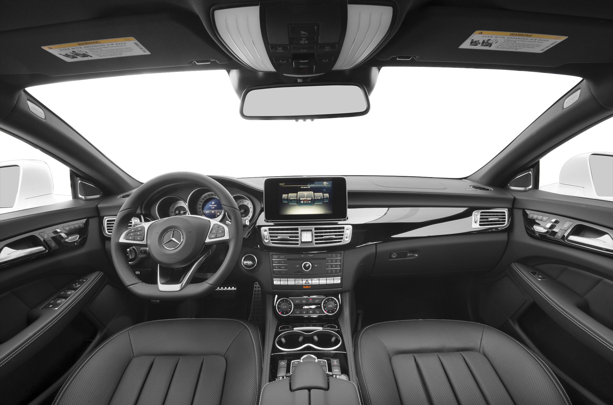 Luxury car interior with dashboard, steering wheel, and infotainment screen