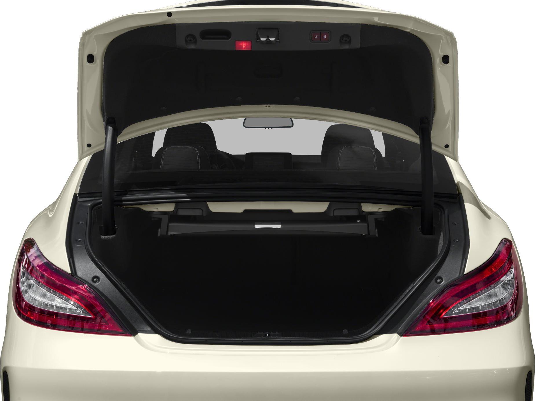 Open trunk interior and rear taillights of a luxury coupe
