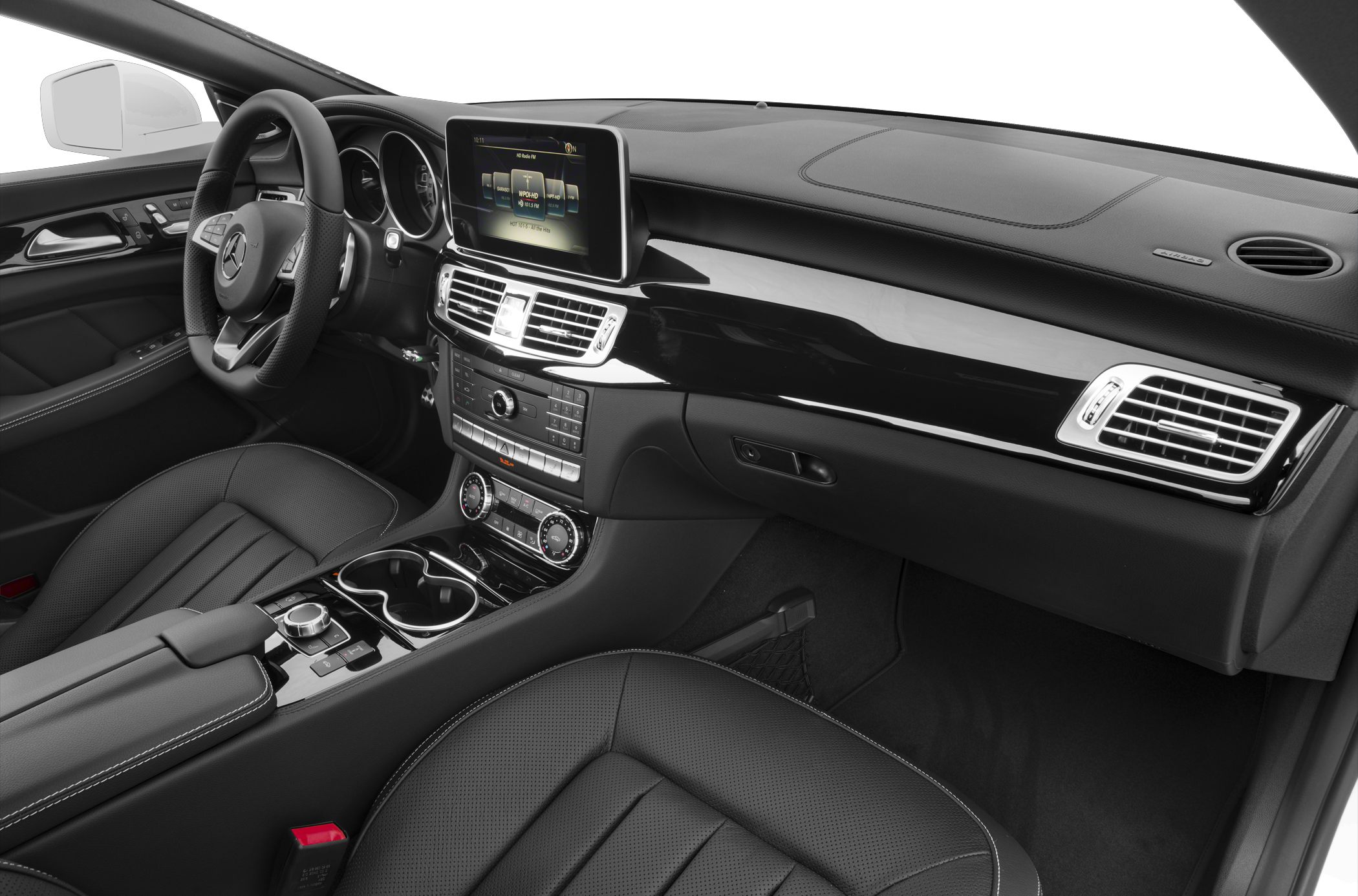 Luxury car interior with infotainment screen and black leather upholstery