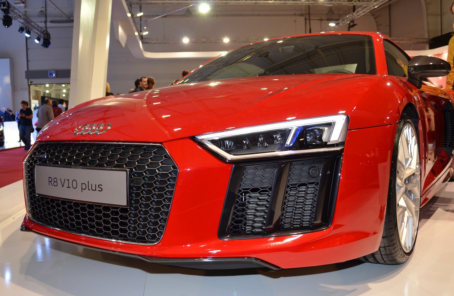 Front grille and LED headlight close-up with honeycomb pattern