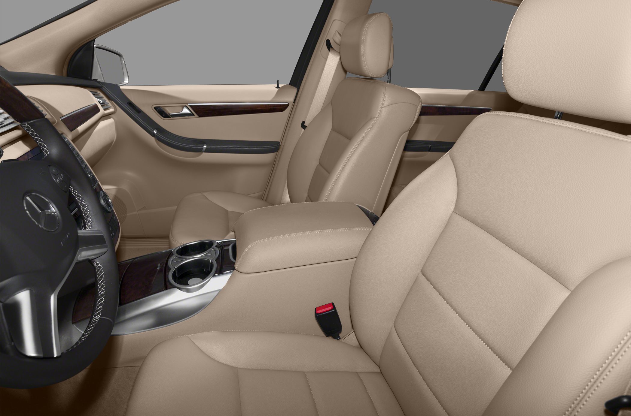 Beige leather seats with center console and cup holders