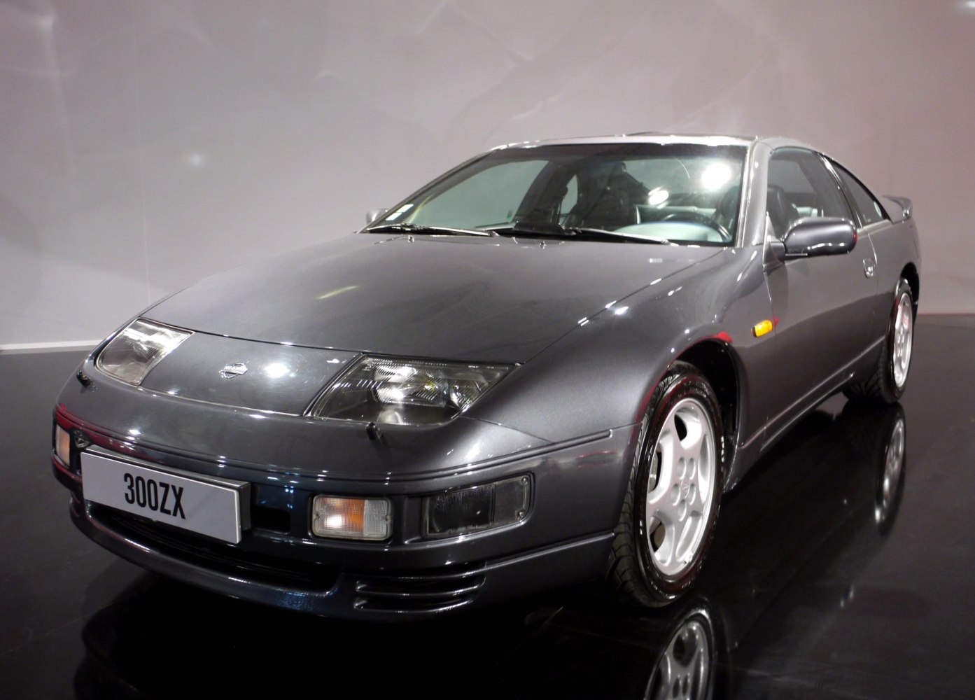 Pop-up headlights, sleek sports coupe, alloy wheels