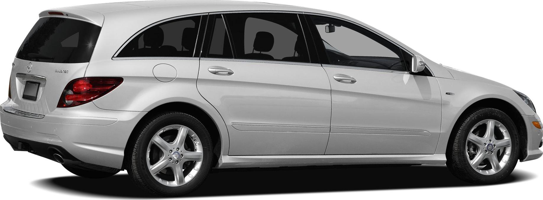 Luxury long station wagon with alloy wheels side profile