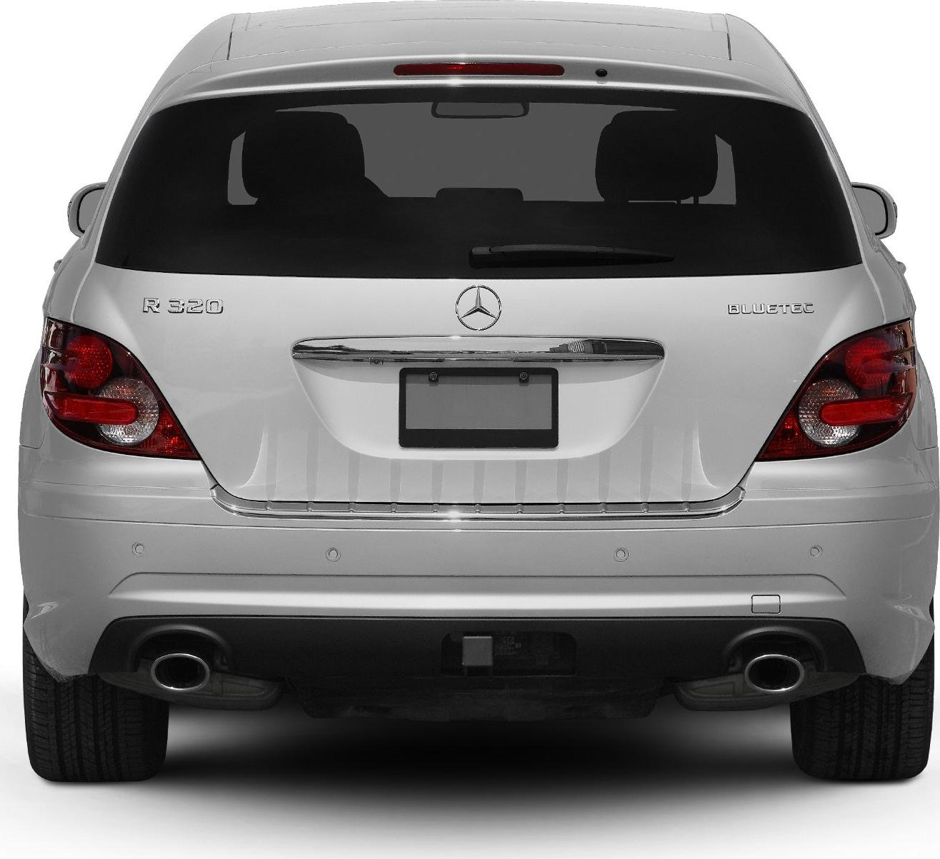 Rear view showing Bluetec badge and dual exhaust on a large luxury SUV