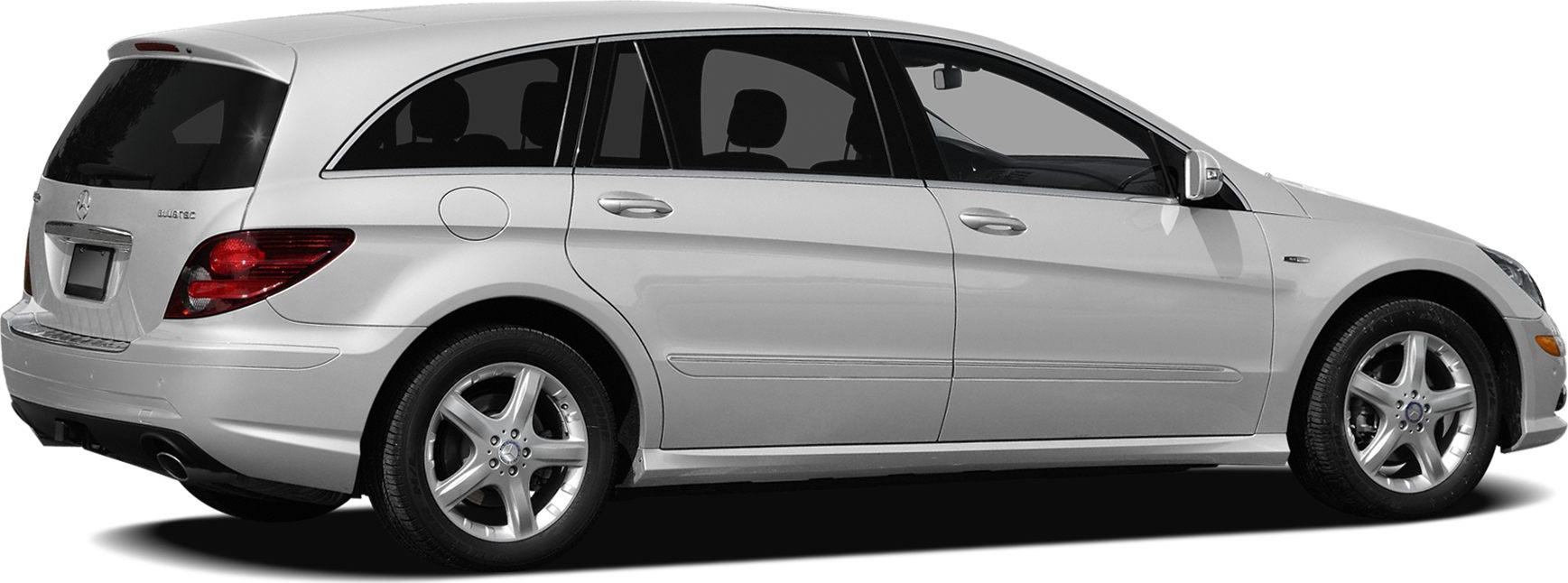 Luxury extended station wagon side profile with alloy wheels and rear spoiler
