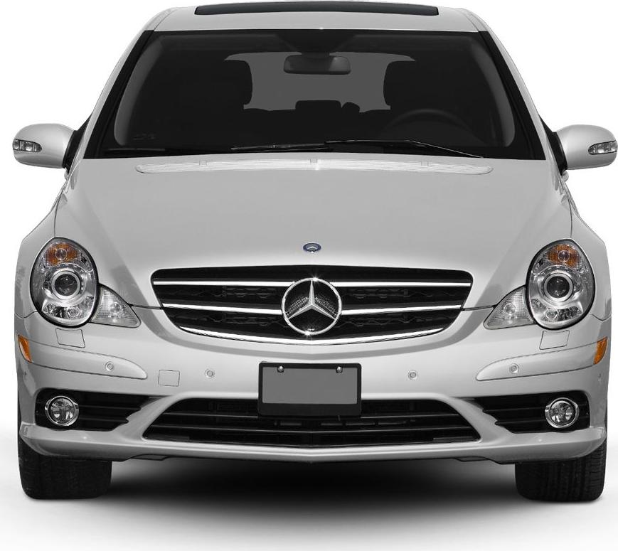 Close-up front view with headlights, grille, and emblem