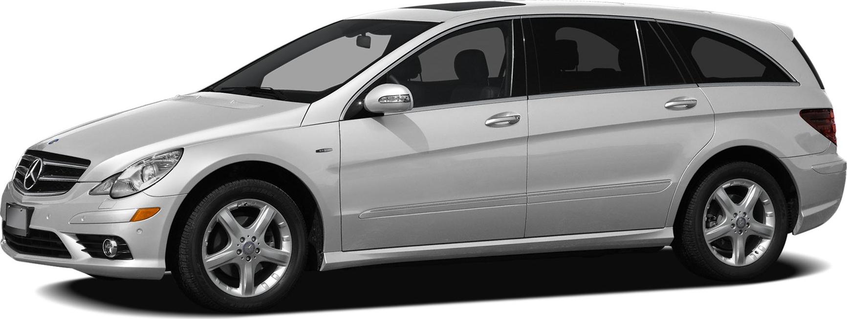 Silver long MPV with five-spoke wheels, front side view