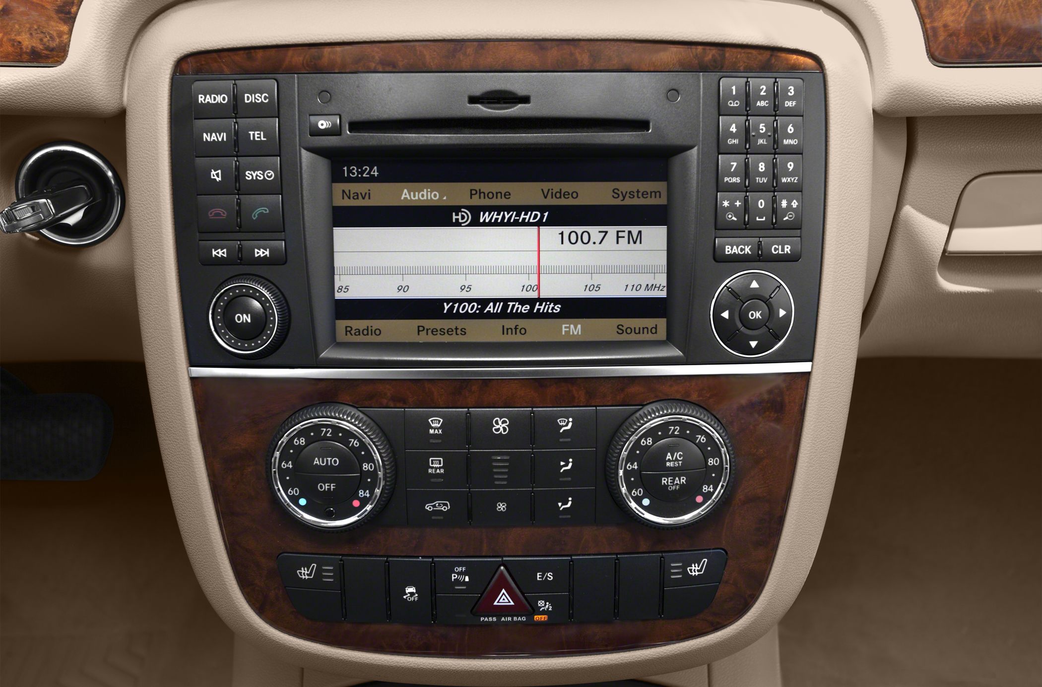 Center console with radio, navigation, and dual-zone climate controls