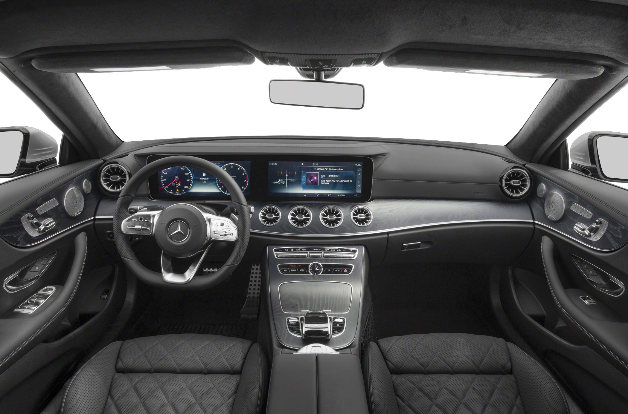 Modern digital dashboard with premium quilted seats and circular vents